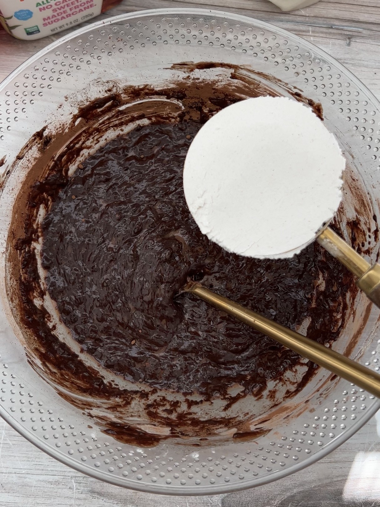 Step 2: Mix the almond or oat milk, melted vegan butter, sugar, baking powder and baking soda, vanilla, and cocoa powder together until smooth.