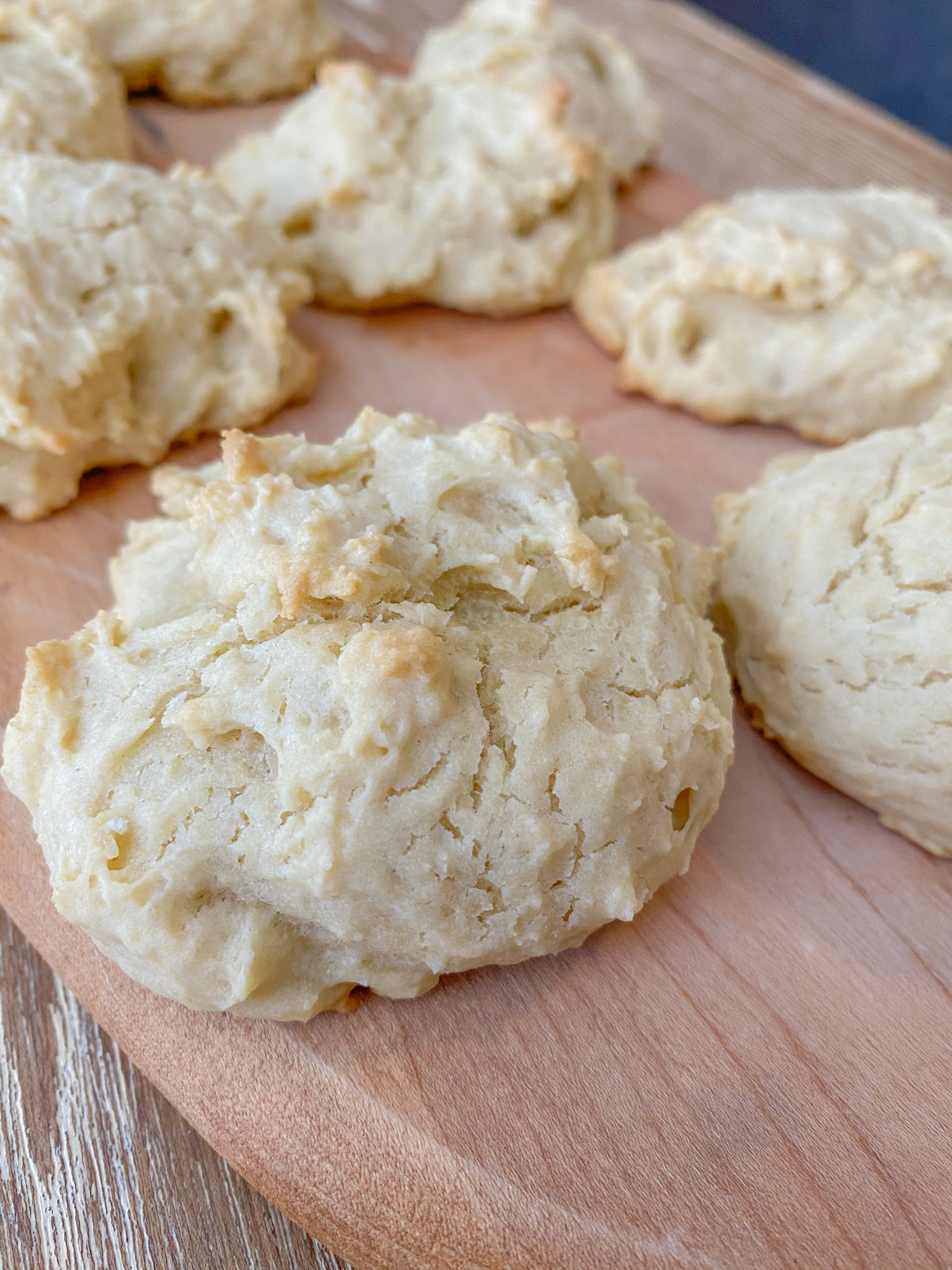 Easy Vegan Drop Biscuits on a wooden cutting board.