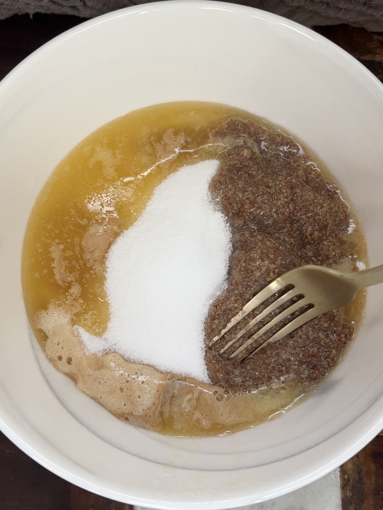 mixing the wet ingredients for the snickerdoodle cookies