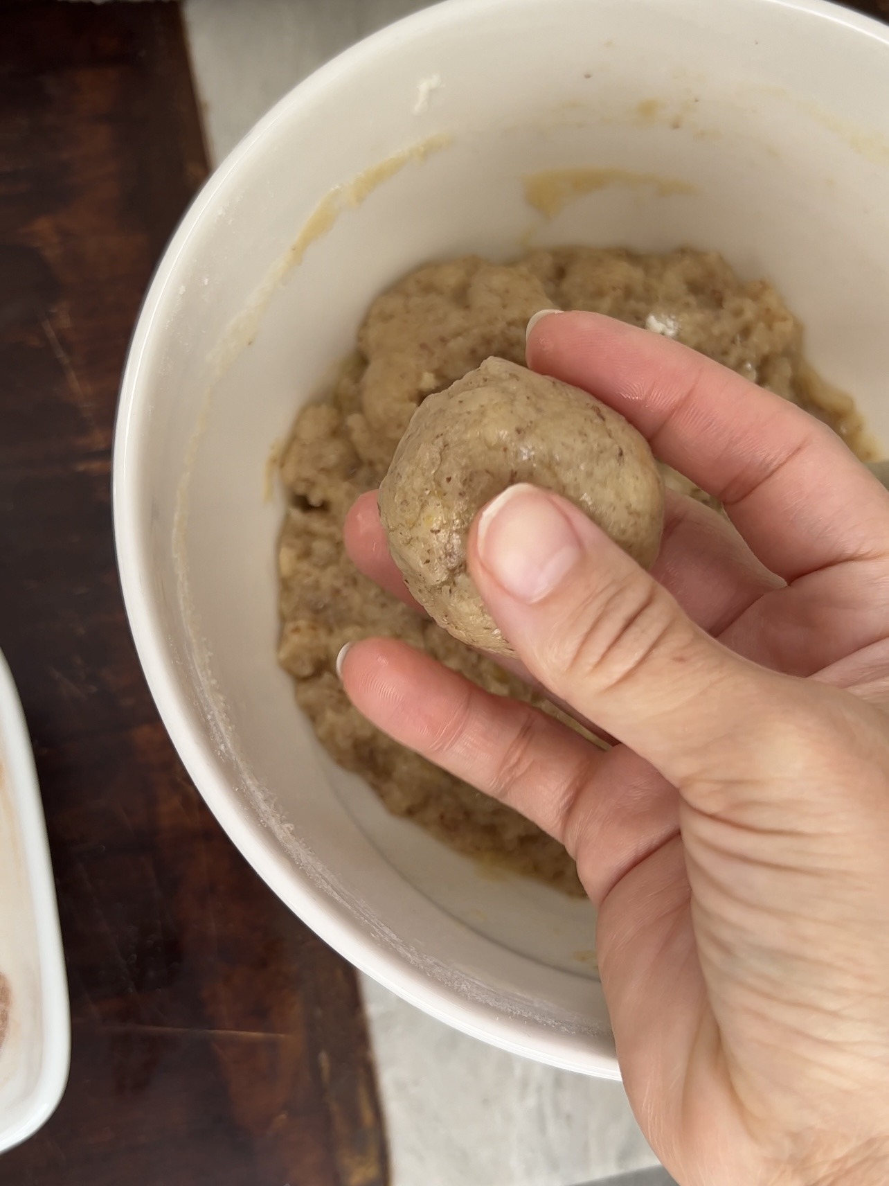 rolling the cookie dough into balls