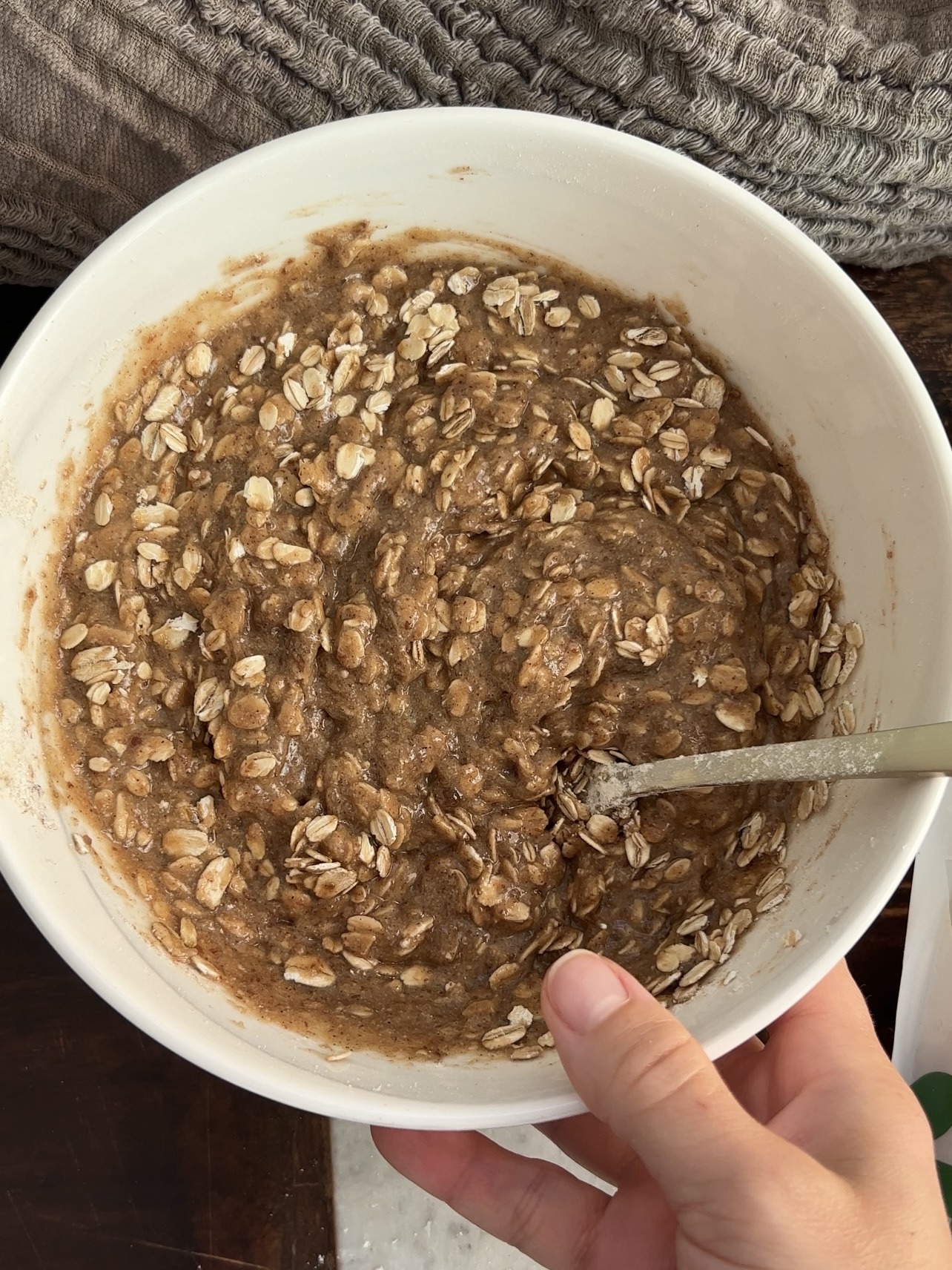 iced oatmeal cookies - adding the oats to the cookie dough