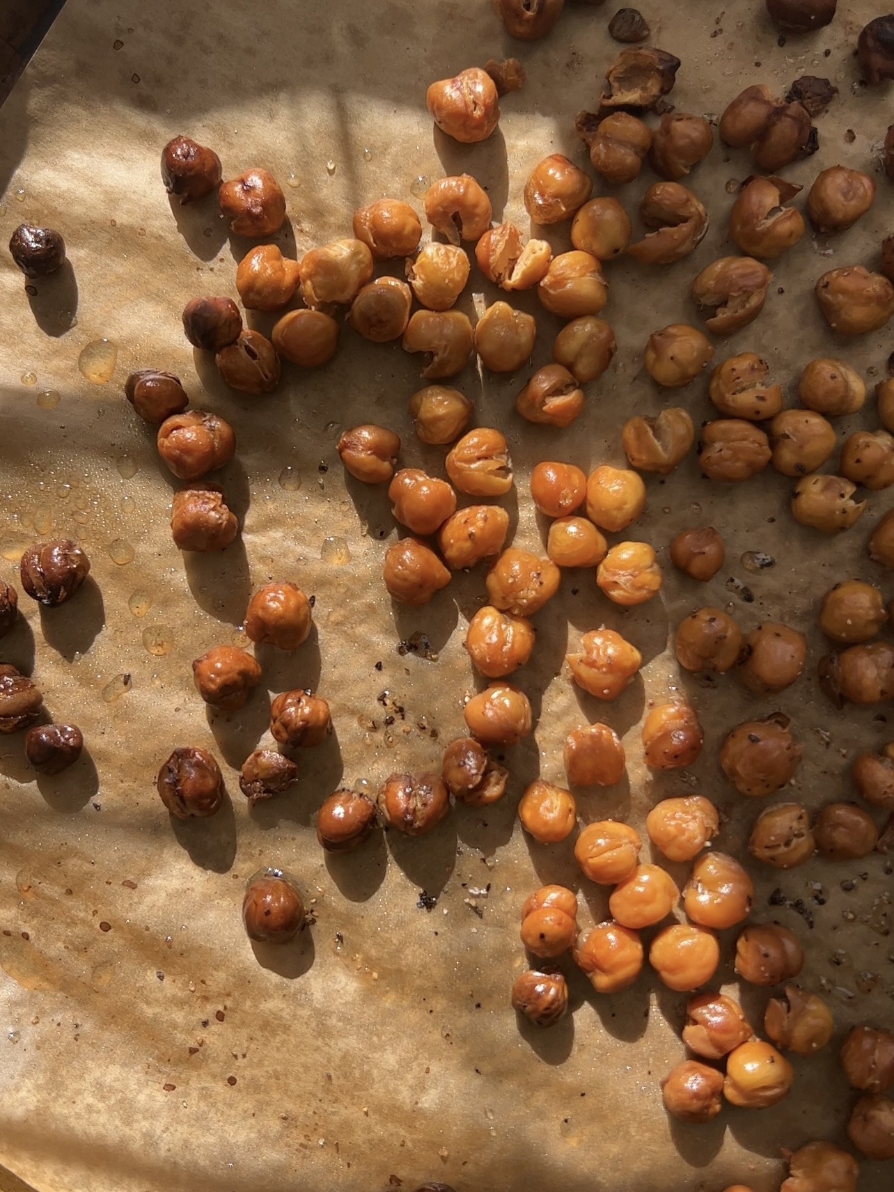 Chickpeas after being baked on the baking sheet. 