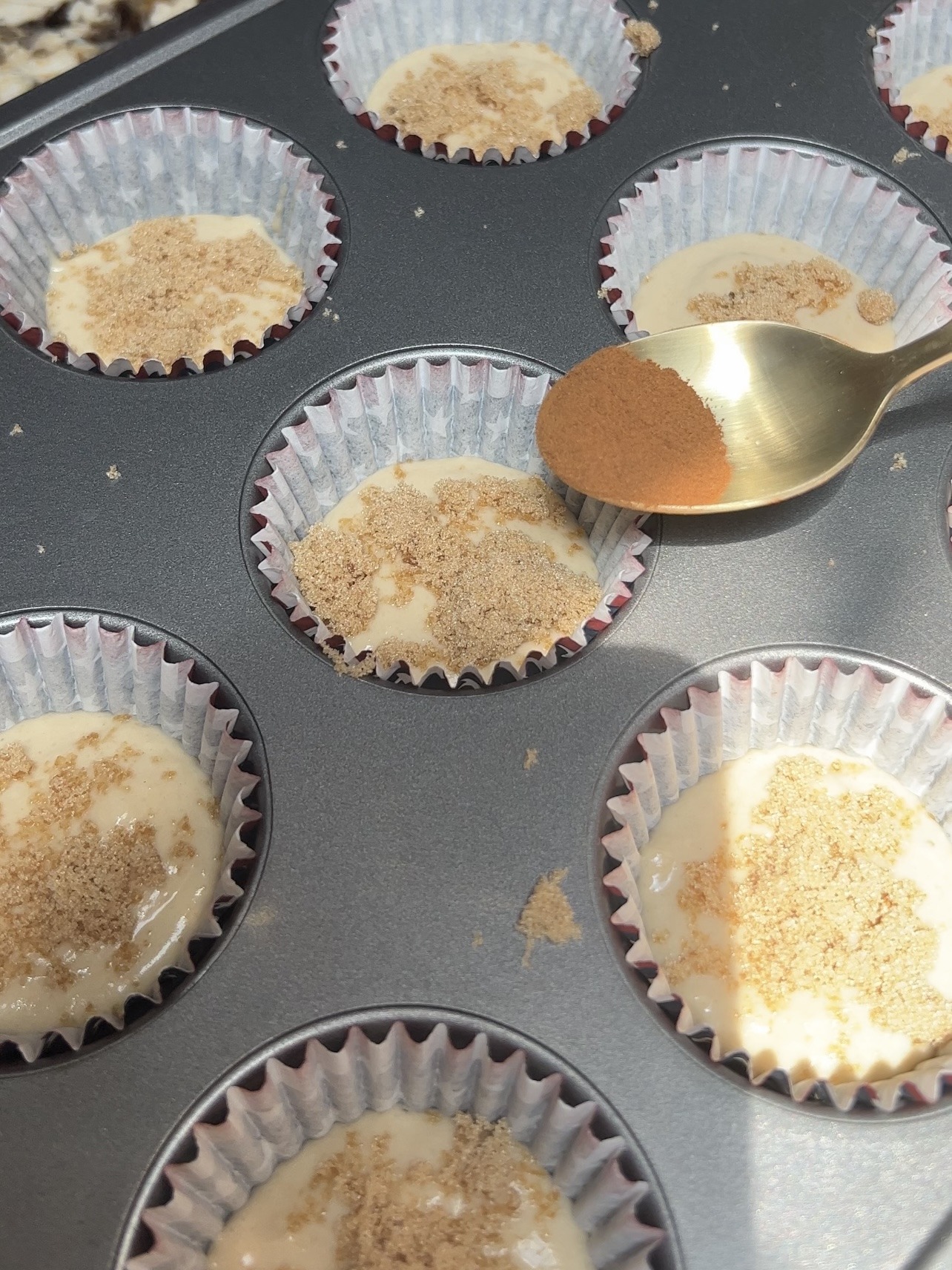 adding the brown sugar and cinnamon into the coffee cake cupcakes