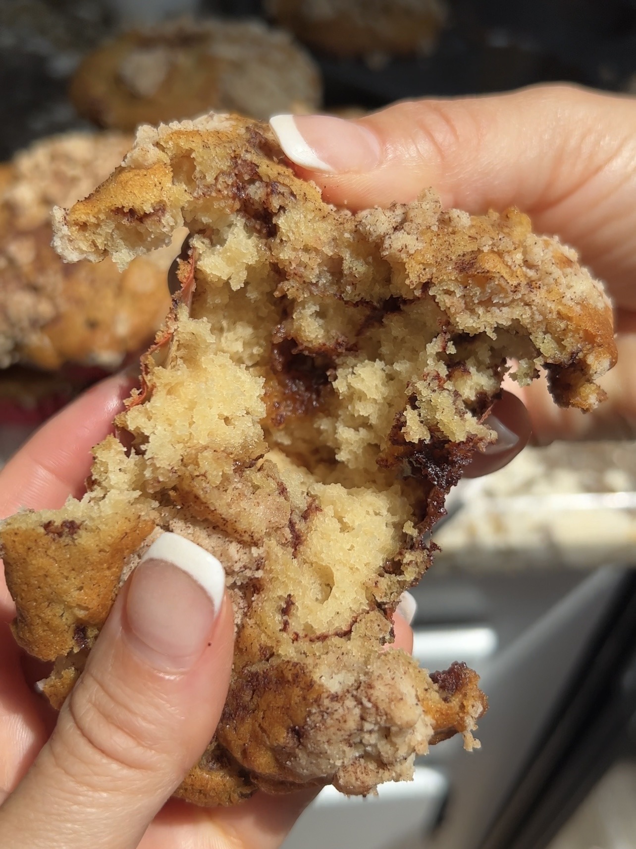 revealing the inside of these moist and tender vegan coffee cake cupcakes