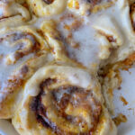 Pumpkin Cinnamon Rolls with Vegan Cream Cheese Icing