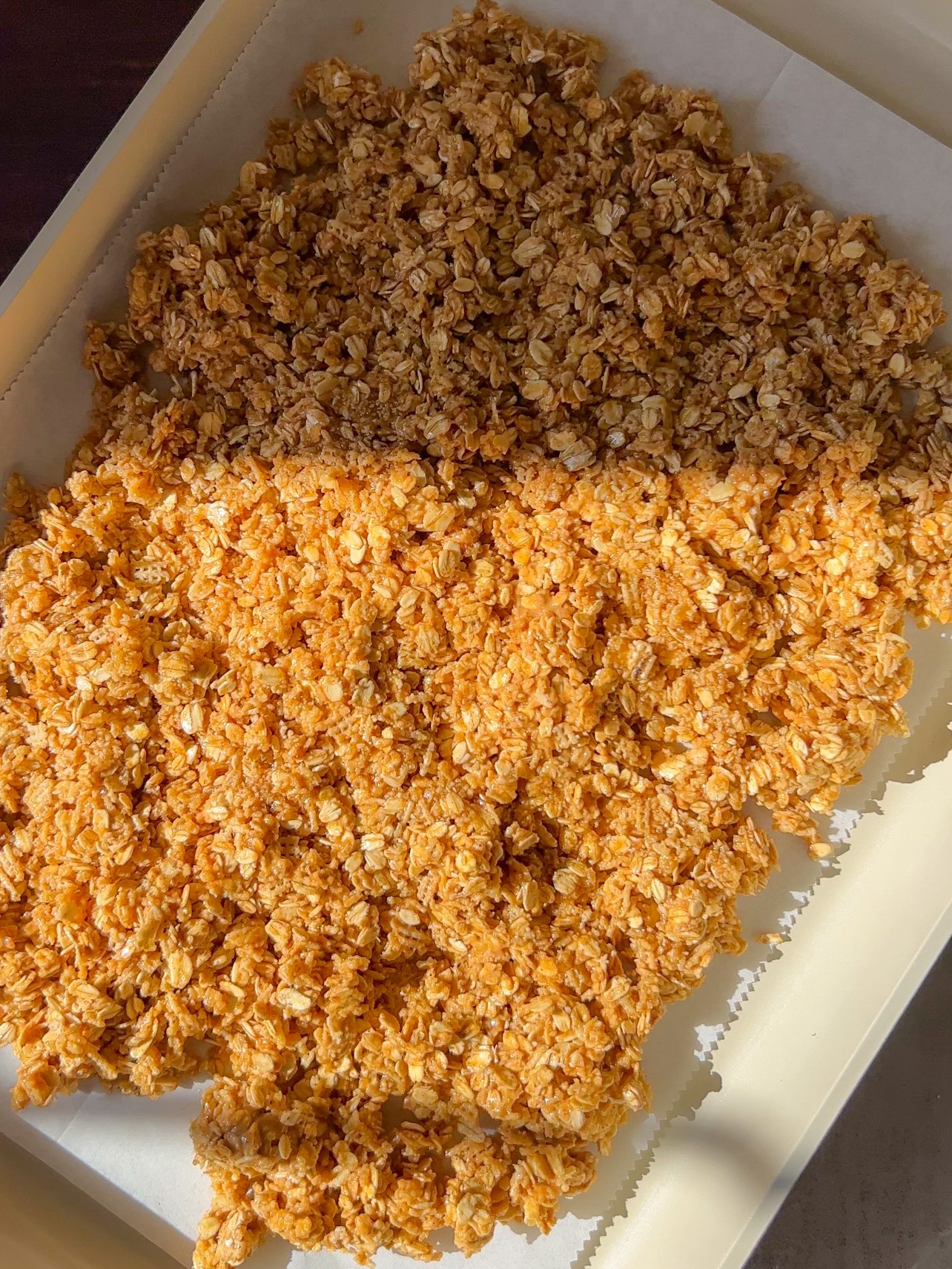 peanut butter granola on a baking sheet