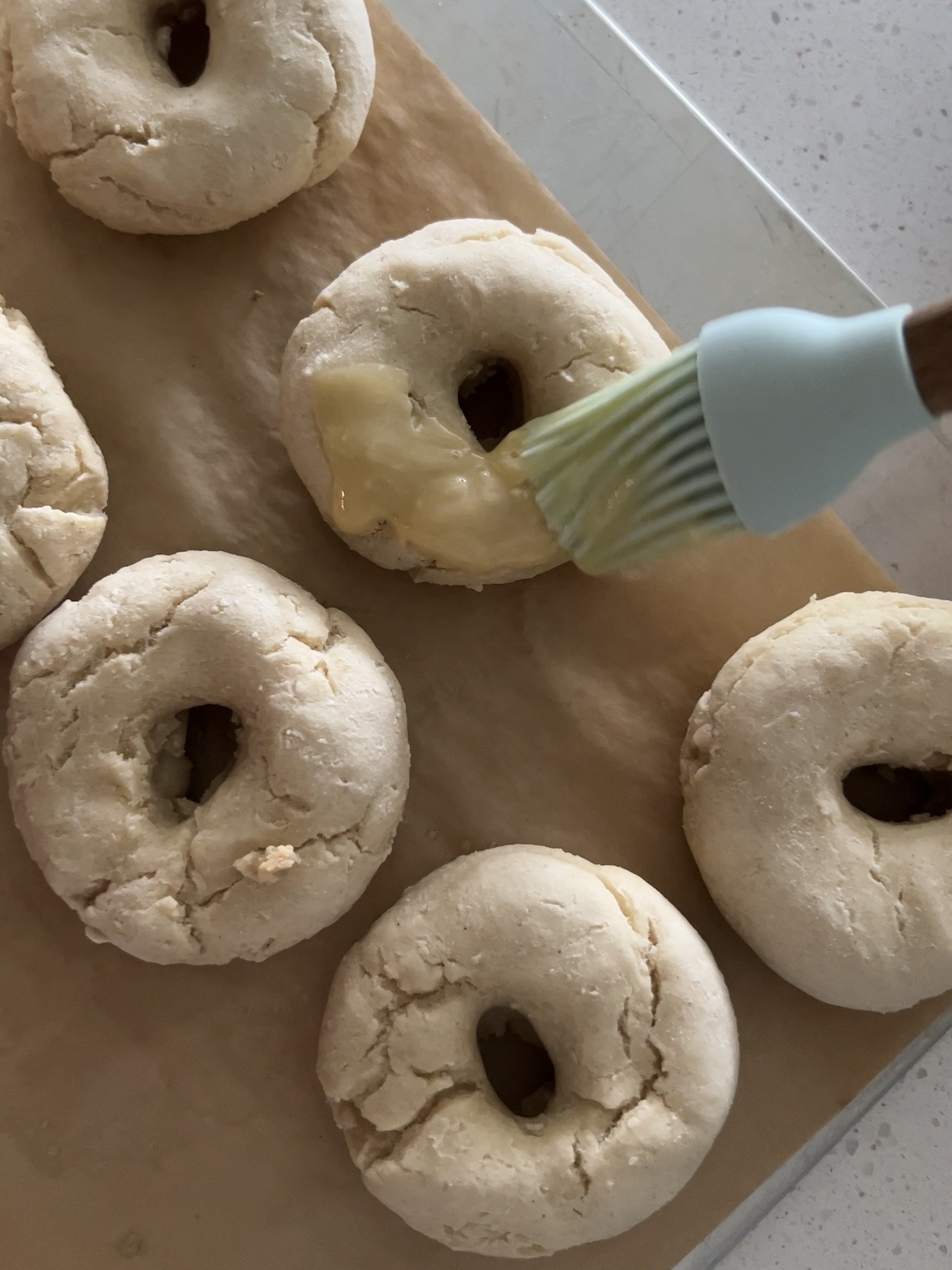 Step 3: Use a pastry brush to brush the tops of each bagel with melted vegan butter and then sprinkle the tops with everything bagel seasoning (about ½ tablespoon each + more to taste). 