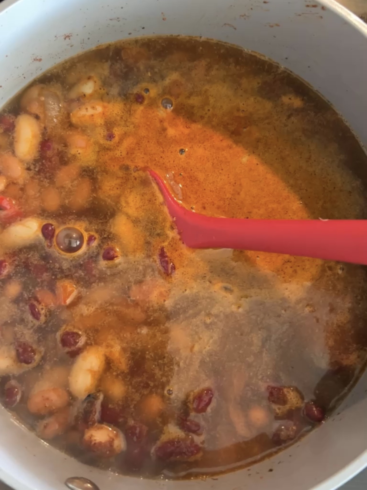 Chili before being simmered in a large grey pot. 