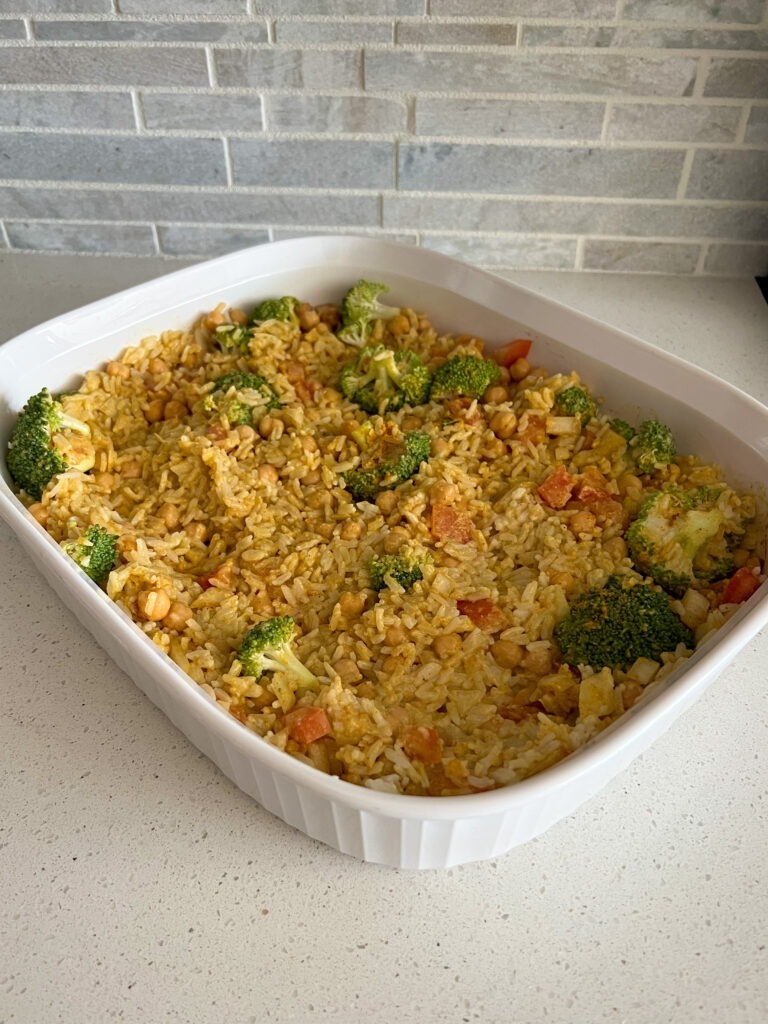 Coconut curry casserole with all of the ingredients mixed together and ready to bake. 