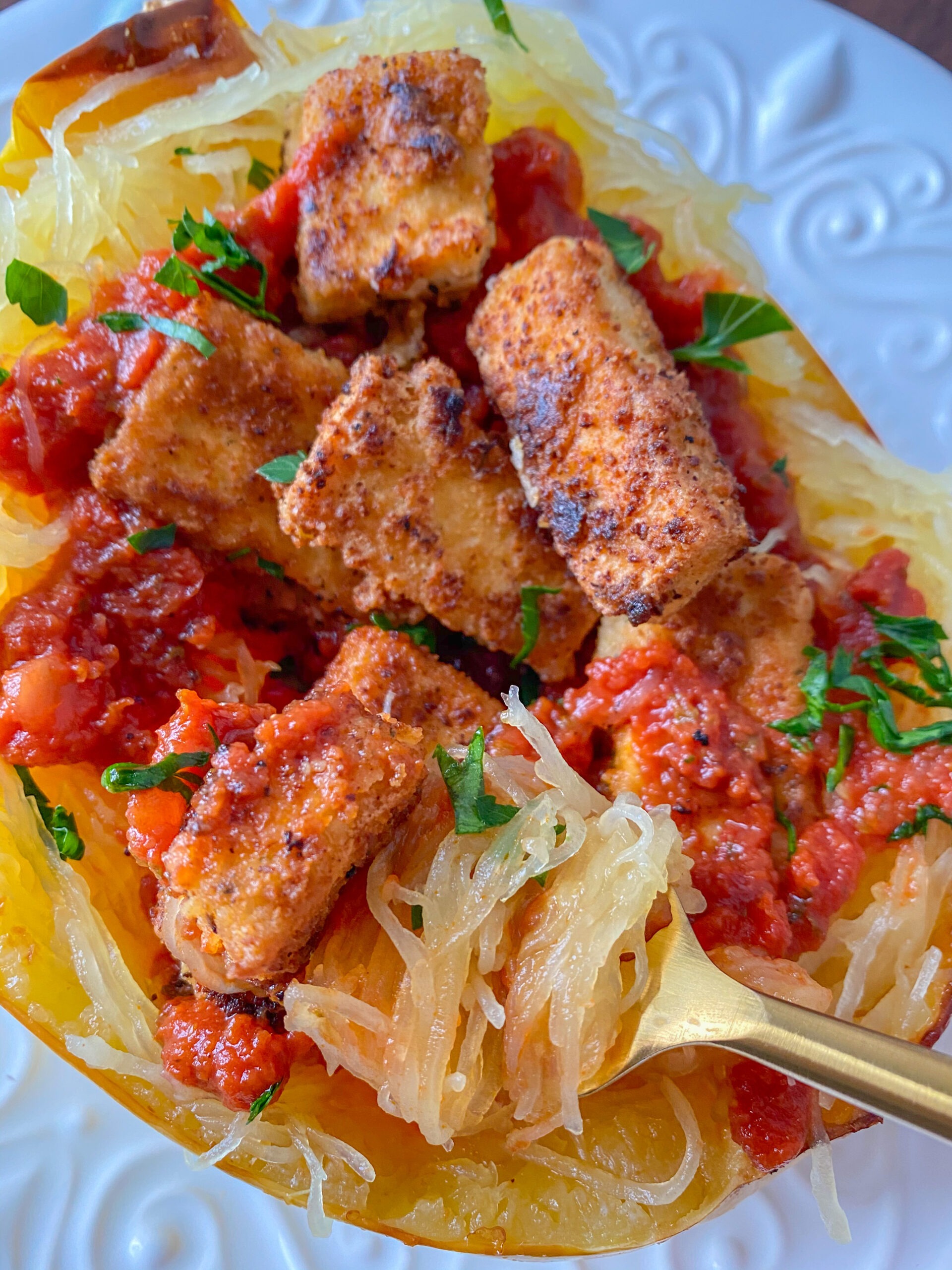 Say hello to your new favorite mouthwatering and filling plant-based meal! This vegan and gluten-free friendly tofu parmesan and spaghetti squash is going to knock your socks off! Even meat-lover will enjoy.