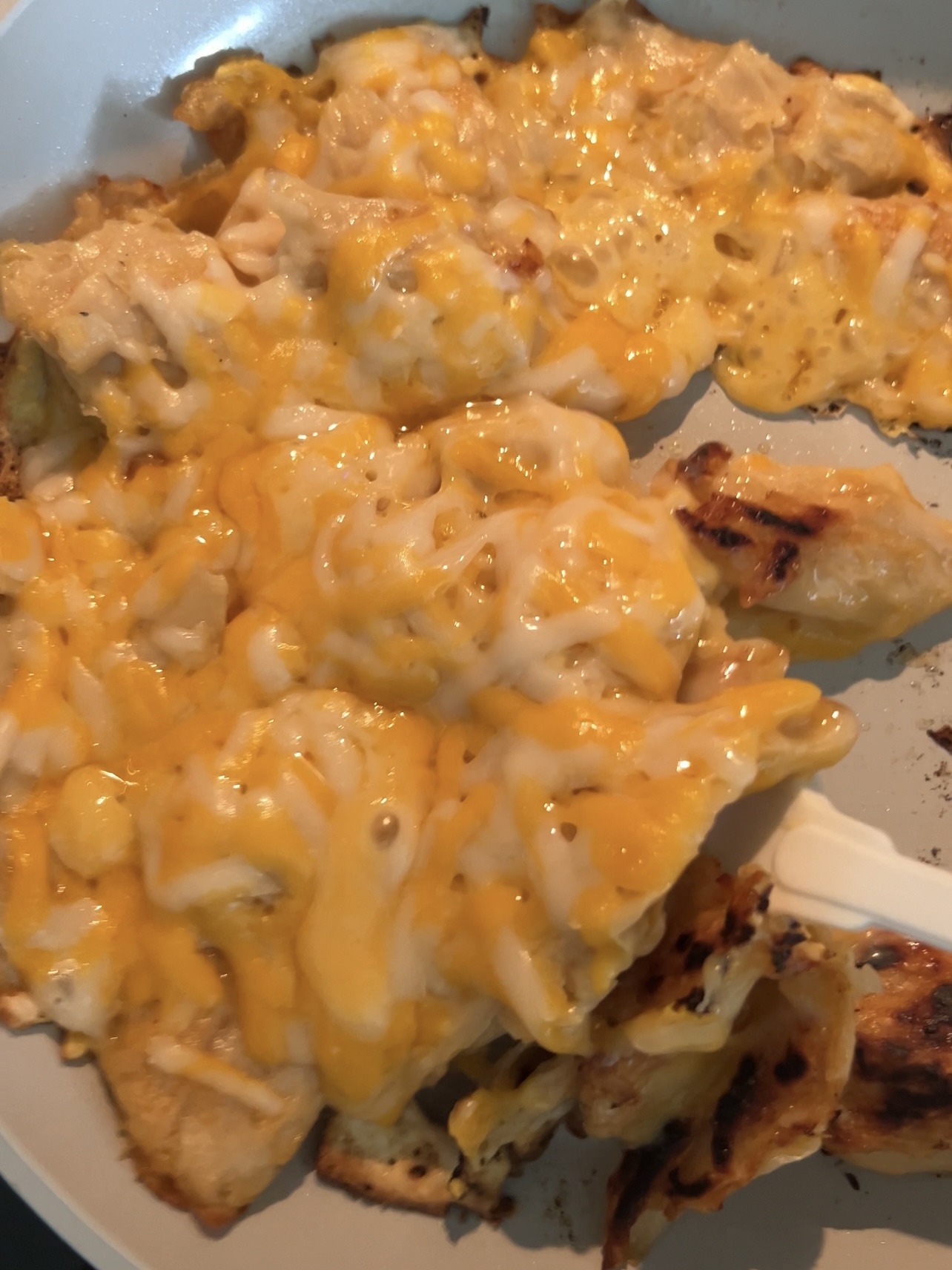 melty vegan cheese over the vegan chicken