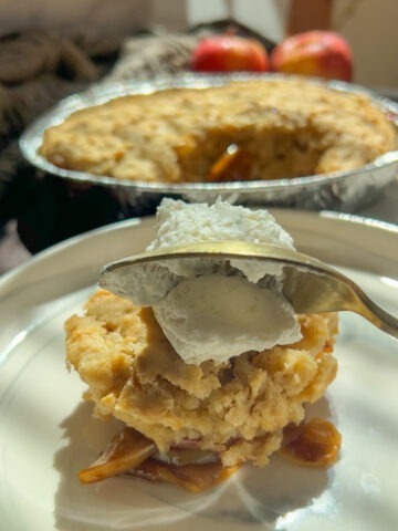 whipped cream on top of the easy apple cobbler