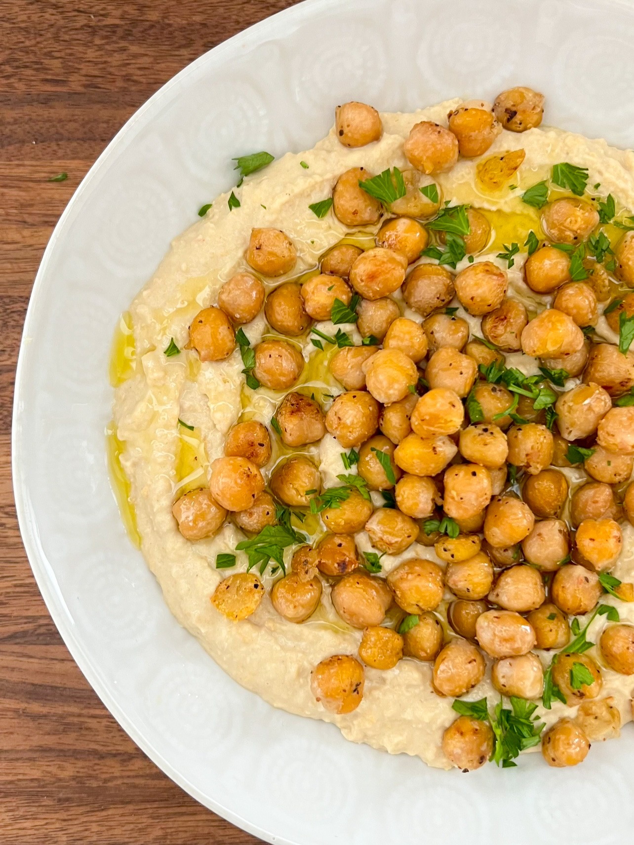 Easy hummus recipe topped with crispy chickpeas.